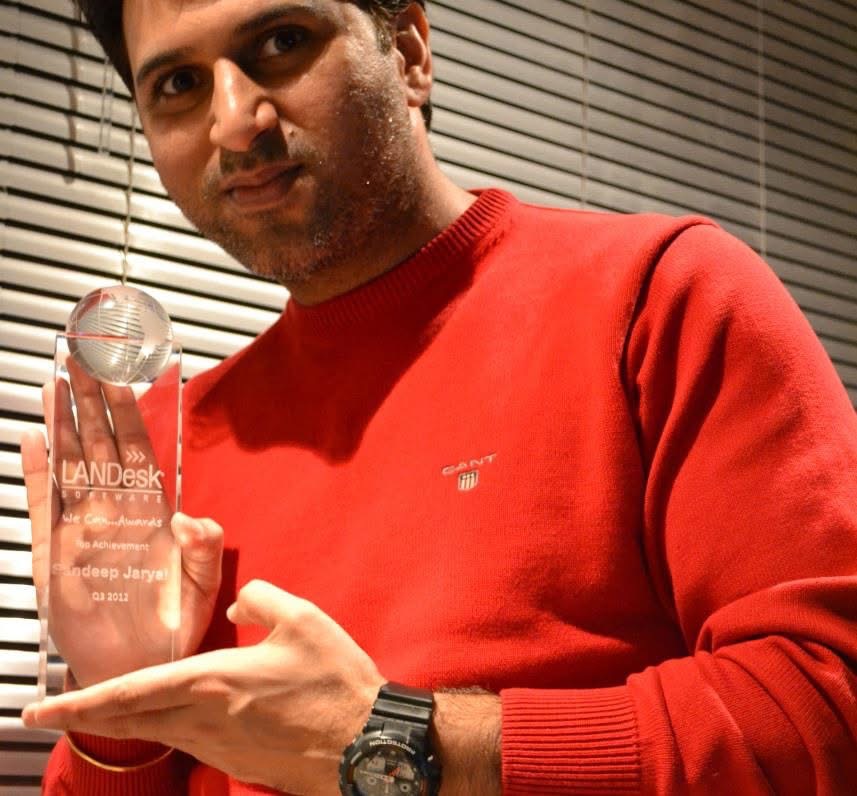 Receiving a LANDESK achievement award in 2012